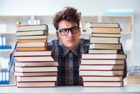 Illustration of a doctoral student between stacked books