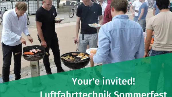 Menschen beim Grillen vor den Luftfahrttechniklaboren